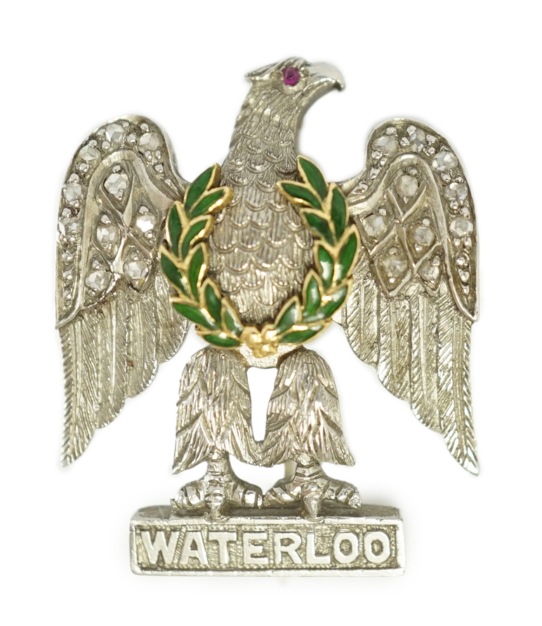 An Edwardian white gold rose cut diamond and enamel set Waterloo commemorative sweethearts brooch, modelled as an eagle